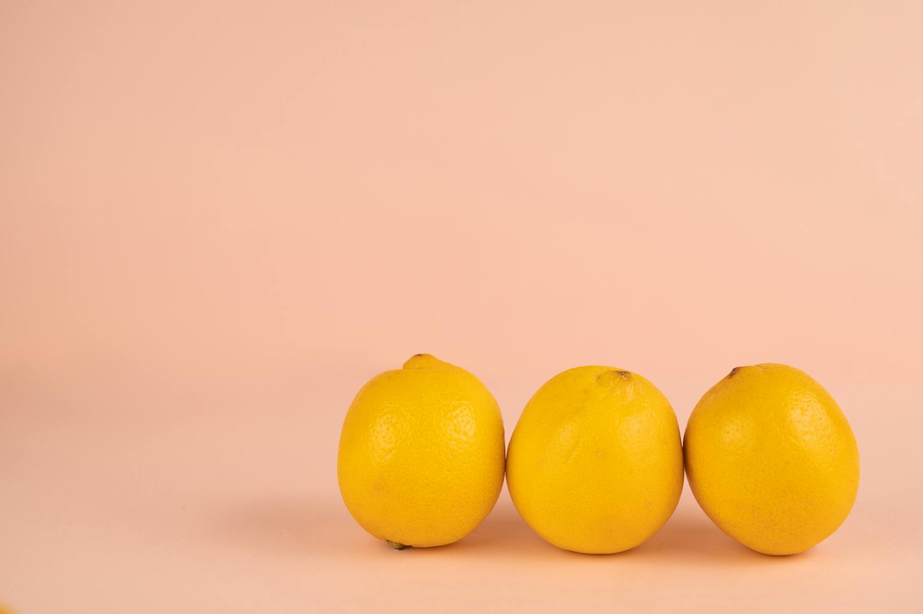 Colorful sex toys arranged on a bright yellow background showcasing diverse vibrator designs